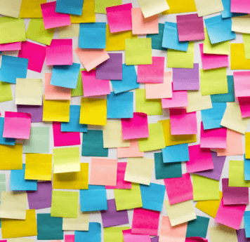 Organized project backlog with colorful sticky notes